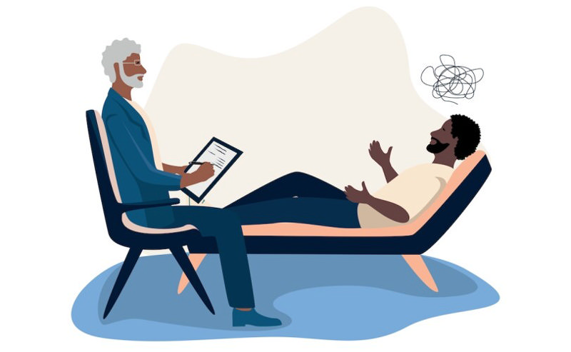 مردی که در جلسهٔ تراپی روی صندلی دراز کشیده و از وسواس فکری‌اش به دکتر می‌گوید