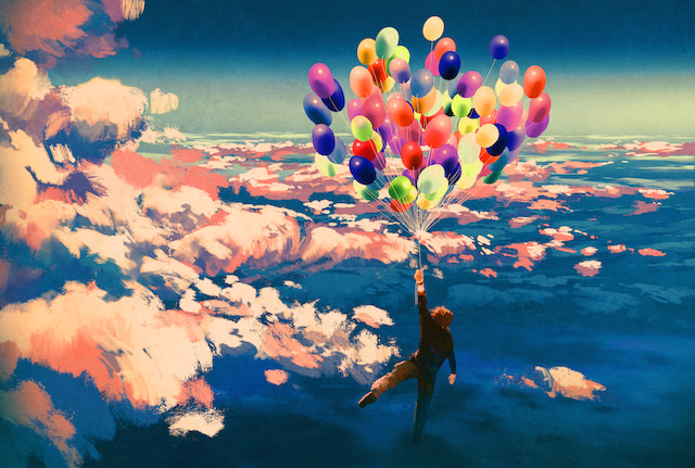 پسری که سوار بر بادکنک‌های رنگی بر فراز آسمان پرواز می‌کند