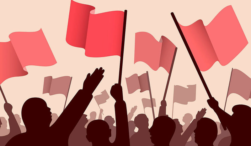 کارتونی از مردم با پرچمهای قرمز